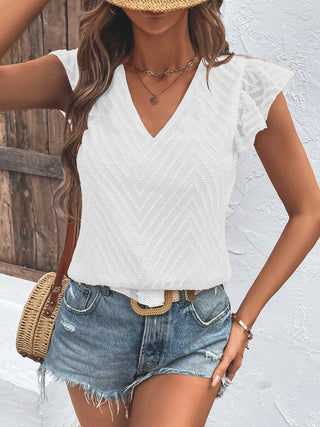 Shop Textured V-Neck Cap Sleeve Blouse Now On Klozey Store - Trendy U.S. Premium Women Apparel & Accessories And Be Up-To-Fashion!