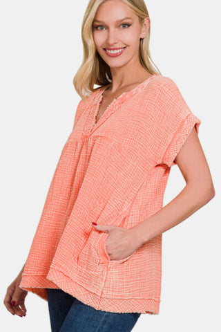 Shop Zenana Washed Raw Hem Short Sleeve Blouse with Pockets Now On Klozey Store - Trendy U.S. Premium Women Apparel & Accessories And Be Up-To-Fashion!