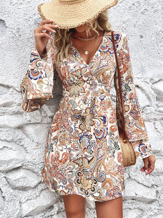 Shop Printed Surplice Neck Flare Sleeve Dress Now On Klozey Store - Trendy U.S. Premium Women Apparel & Accessories And Be Up-To-Fashion!