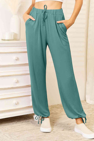 Shop Basic Bae Full Size Soft Rayon Drawstring Waist Pants with Pockets Now On Klozey Store - Trendy U.S. Premium Women Apparel & Accessories And Be Up-To-Fashion!