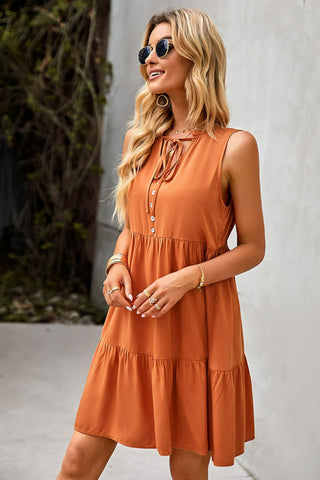 Shop Tie Neck Tiered Dress with Decorative Buttons Now On Klozey Store - Trendy U.S. Premium Women Apparel & Accessories And Be Up-To-Fashion!