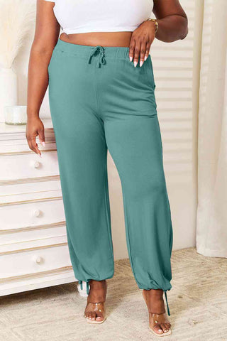 Shop Basic Bae Full Size Soft Rayon Drawstring Waist Pants with Pockets Now On Klozey Store - Trendy U.S. Premium Women Apparel & Accessories And Be Up-To-Fashion!