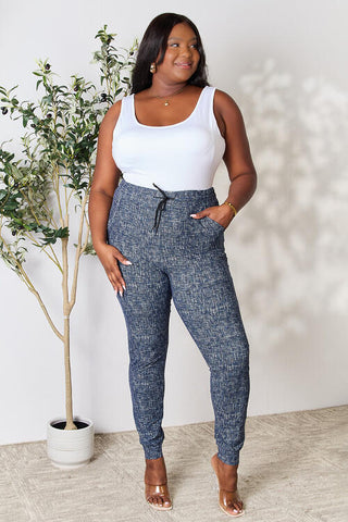 Shop LOVEIT Heathered Drawstring Leggings with Pockets Now On Klozey Store - Trendy U.S. Premium Women Apparel & Accessories And Be Up-To-Fashion!