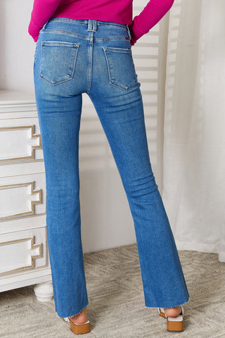 Shop Kancan Full Size Distressed Raw Hem Bootcut Jeans Now On Klozey Store - Trendy U.S. Premium Women Apparel & Accessories And Be Up-To-Fashion!