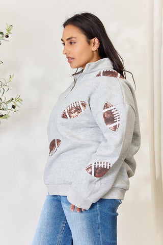 Shop Double Take Full Size Sequin Football Half Zip Long Sleeve Sweatshirt Now On Klozey Store - Trendy U.S. Premium Women Apparel & Accessories And Be Up-To-Fashion!