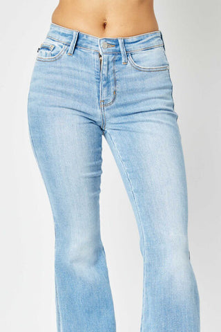 Shop Judy Blue Full Size Mid Rise Raw Hem Slit Flare Jeans Now On Klozey Store - Trendy U.S. Premium Women Apparel & Accessories And Be Up-To-Fashion!