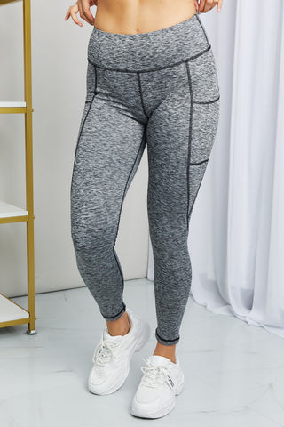 Shop Rae Mode Full Size Heathered Wide Waistband Yoga Leggings Now On Klozey Store - Trendy U.S. Premium Women Apparel & Accessories And Be Up-To-Fashion!