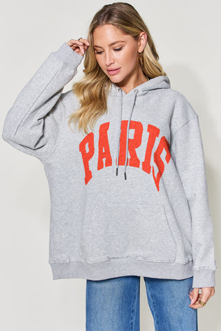 Shop Simply Love Full Size PARIS Long Sleeve Drawstring Hoodie Now On Klozey Store - Trendy U.S. Premium Women Apparel & Accessories And Be Up-To-Fashion!