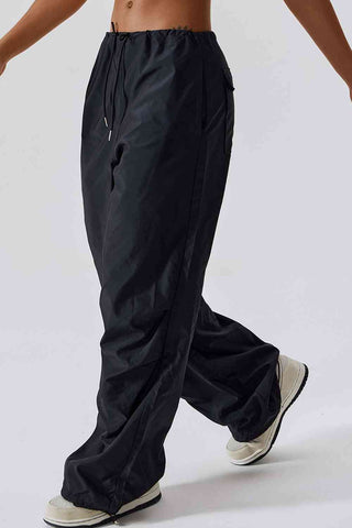 Shop Long Loose Fit Pocketed Sports Pants Now On Klozey Store - Trendy U.S. Premium Women Apparel & Accessories And Be Up-To-Fashion!