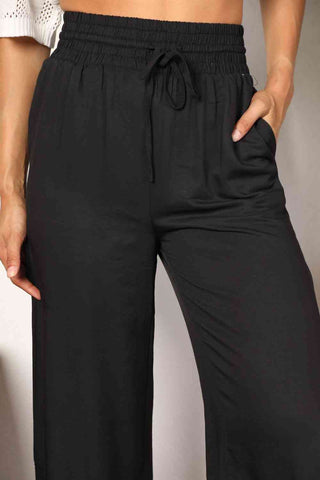 Shop Double Take Drawstring Smocked Waist Wide Leg Pants Now On Klozey Store - Trendy U.S. Premium Women Apparel & Accessories And Be Up-To-Fashion!