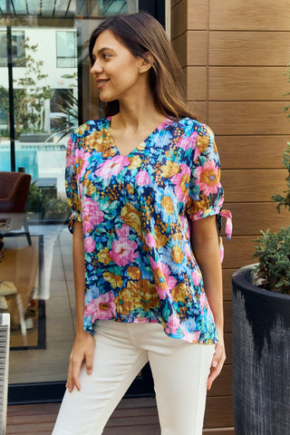 Shop Petal Dew Full Size Floral V-Neck Tie Detail Blouse Now On Klozey Store - Trendy U.S. Premium Women Apparel & Accessories And Be Up-To-Fashion!