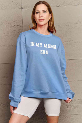 Shop Simply Love Full Size IN MY MAMA EAR Graphic Sweatshirt Now On Klozey Store - Trendy U.S. Premium Women Apparel & Accessories And Be Up-To-Fashion!