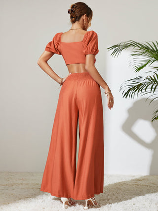 Shop Tie Front Cropped Top and Smocked Wide Leg Pants Set Now On Klozey Store - Trendy U.S. Premium Women Apparel & Accessories And Be Up-To-Fashion!