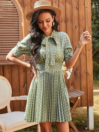 Shop Polka Dot Pleated Tie Neck Smocked Waist Dress Now On Klozey Store - Trendy U.S. Premium Women Apparel & Accessories And Be Up-To-Fashion!