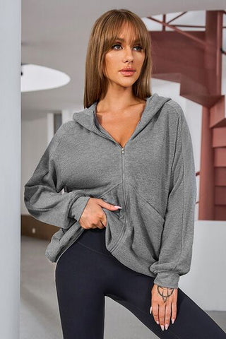 Shop Pocketed Zip Up Dropped Shoulder Hooded Jacket Now On Klozey Store - Trendy U.S. Premium Women Apparel & Accessories And Be Up-To-Fashion!