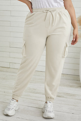 Shop Plus Size Elastic Waist Joggers with Pockets Now On Klozey Store - Trendy U.S. Premium Women Apparel & Accessories And Be Up-To-Fashion!