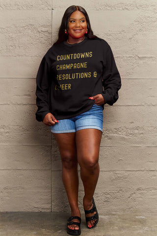 Shop Simply Love Full Size COUNTDOWNS CHAMPAGNE RESOLUTIONS & CHEER Round Neck Sweatshirt Now On Klozey Store - Trendy U.S. Premium Women Apparel & Accessories And Be Up-To-Fashion!